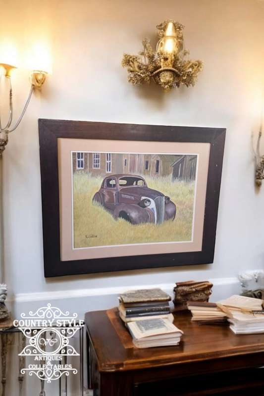 Old Framed Car Behind Glass by Kathleen