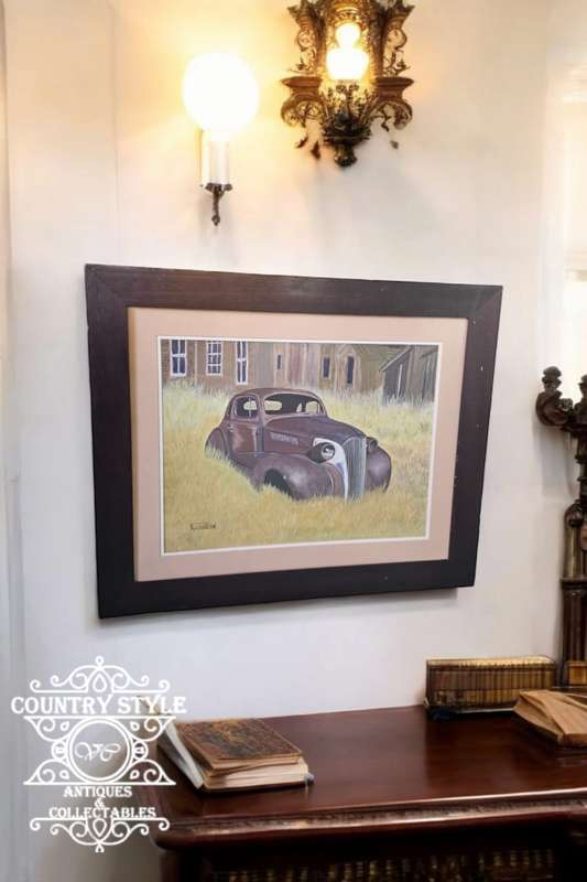Old Framed Car Behind Glass by Kathleen
