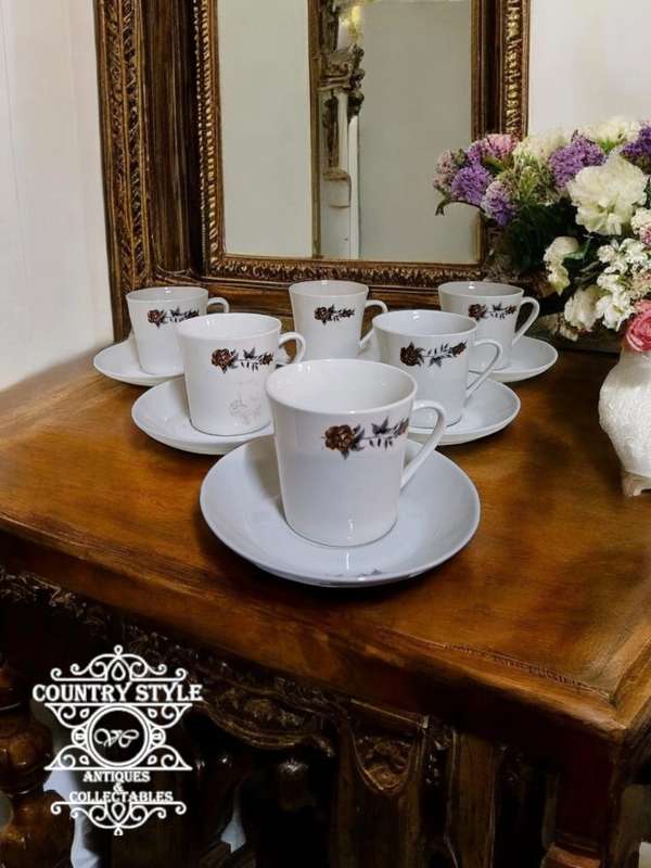 Set of 6 Vintage Tea due's with a rose pattern