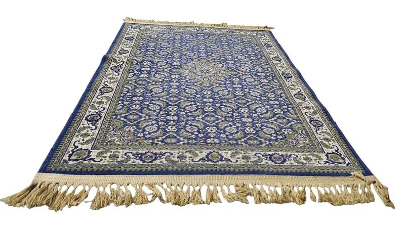 Machine-woven carpet