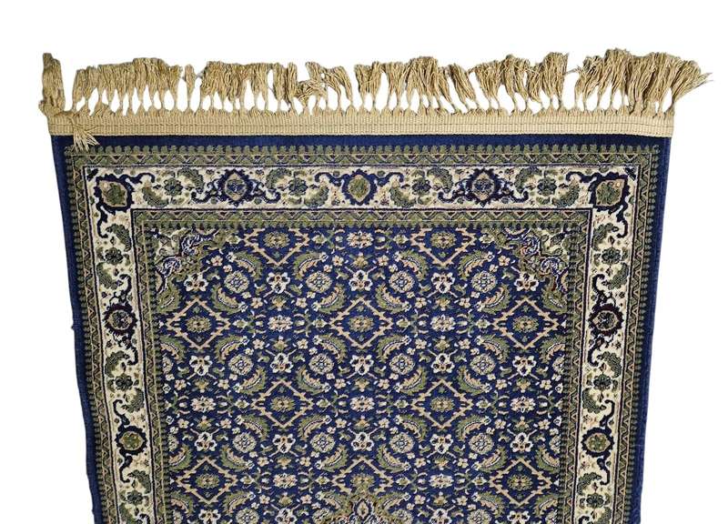 Machine-woven carpet