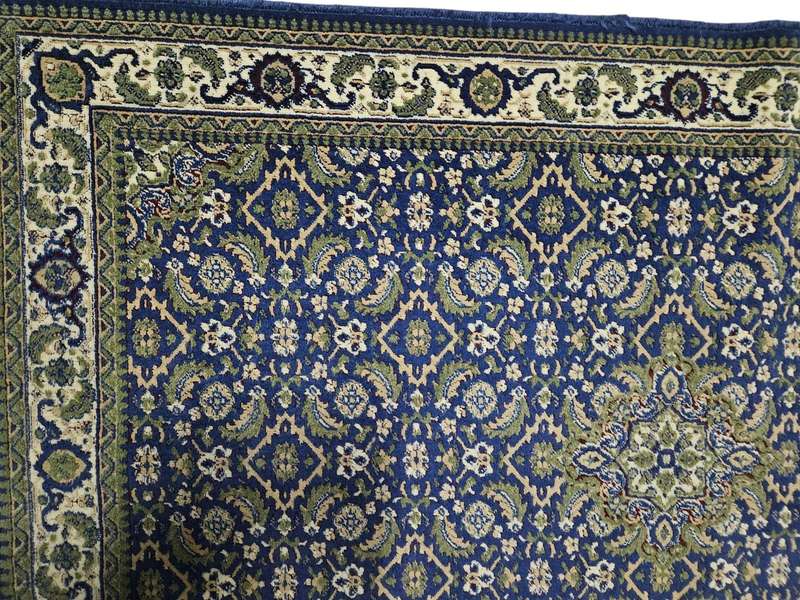 Machine-woven carpet