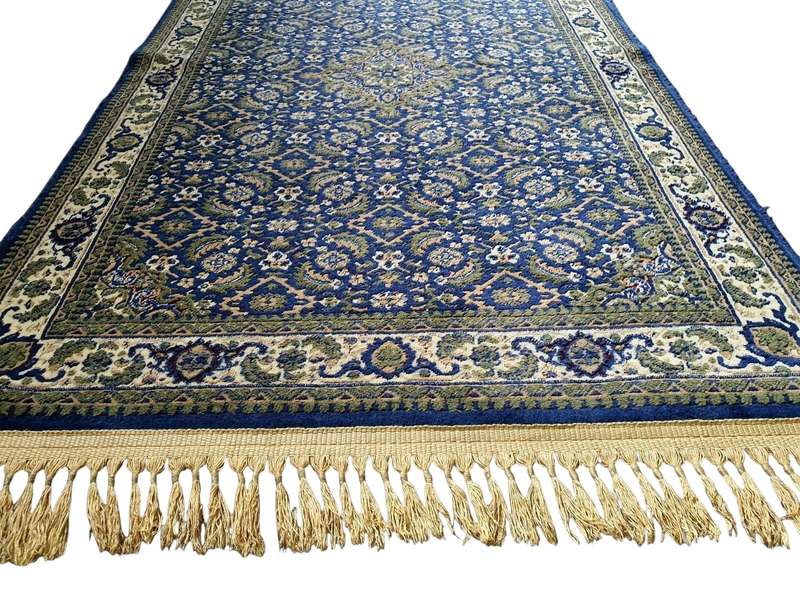 Machine-woven carpet