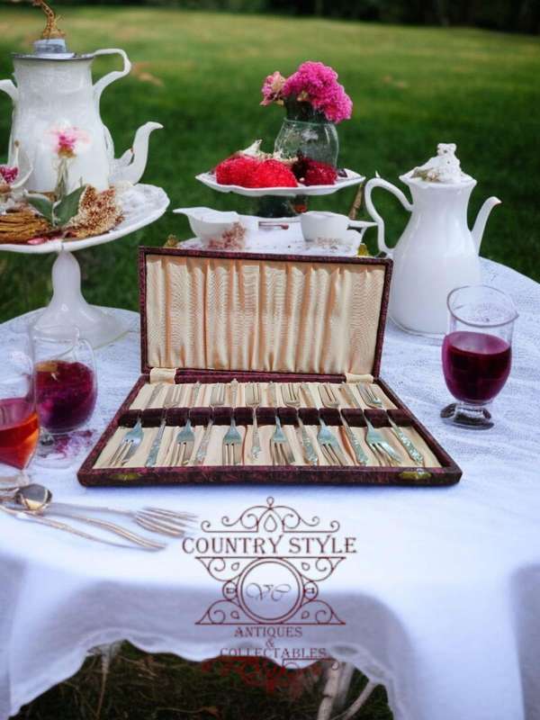 12-piece set of vintage apostle cake forks