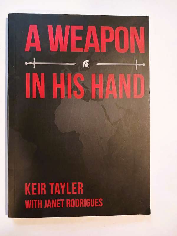 A Weapon in his Hand by Keir Tayler with Janet Rodrigues, signed