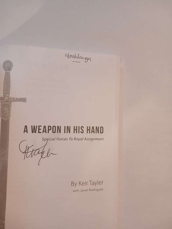 A Weapon in his Hand by Keir Tayler with Janet Rodrigues, signed