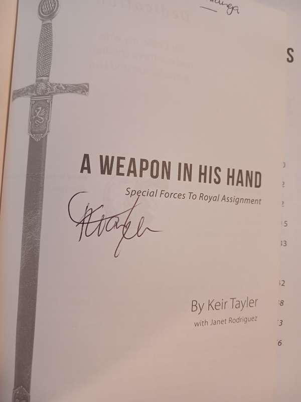 A Weapon in his Hand by Keir Tayler with Janet Rodrigues, signed