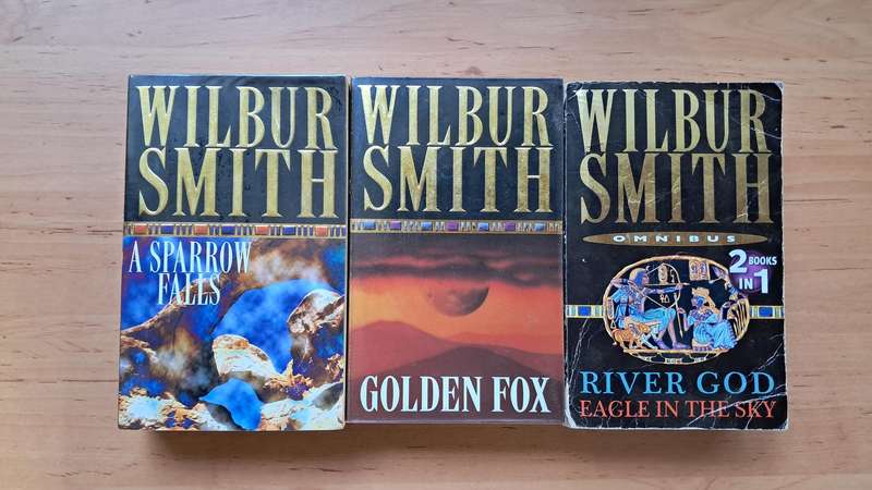 Wilbur Smith 3-book Bundle: A Sparrow Falls, Golden Fox, and River God + Eagle in the Sky (Omnibus)