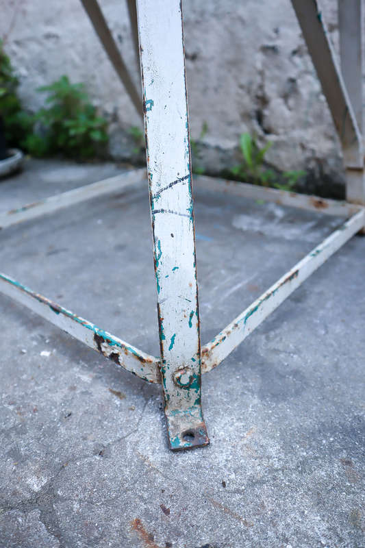 A pair of antique vintage Industrial worker chairs