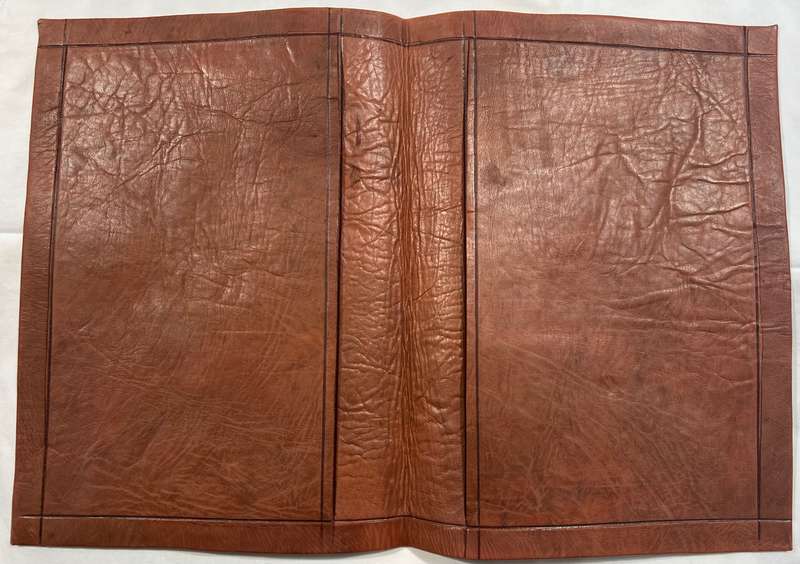 BROWN A4 SIZE SOFT LEATHER FOLDER WITH GOLD DETAILING ON THE FRONT.