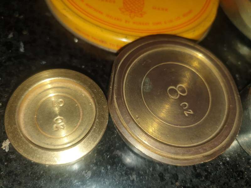 4 old tradition scale weights in tin