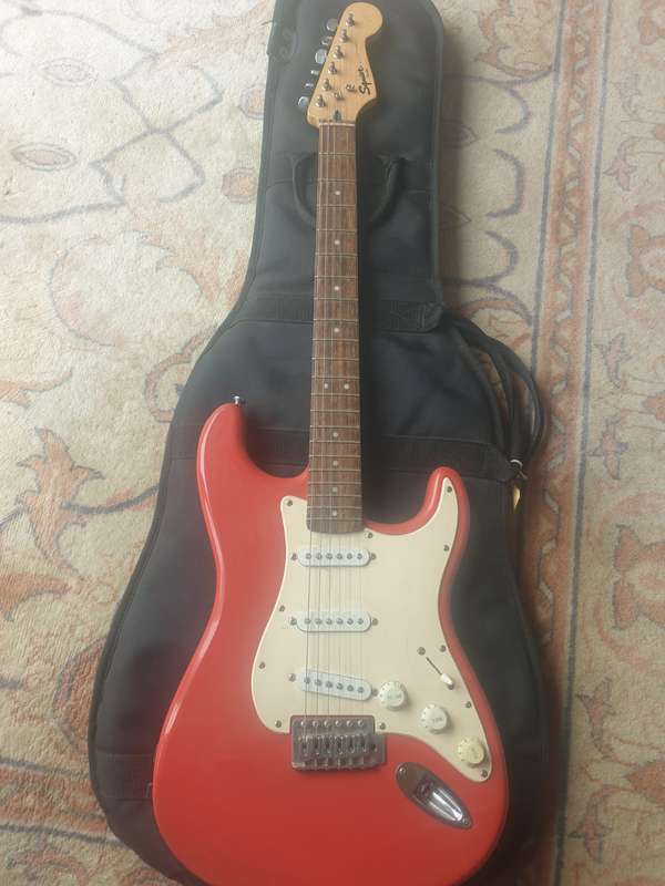 Fender Squire Bullet electric guitar with bag made in Indonesia, Red and white
