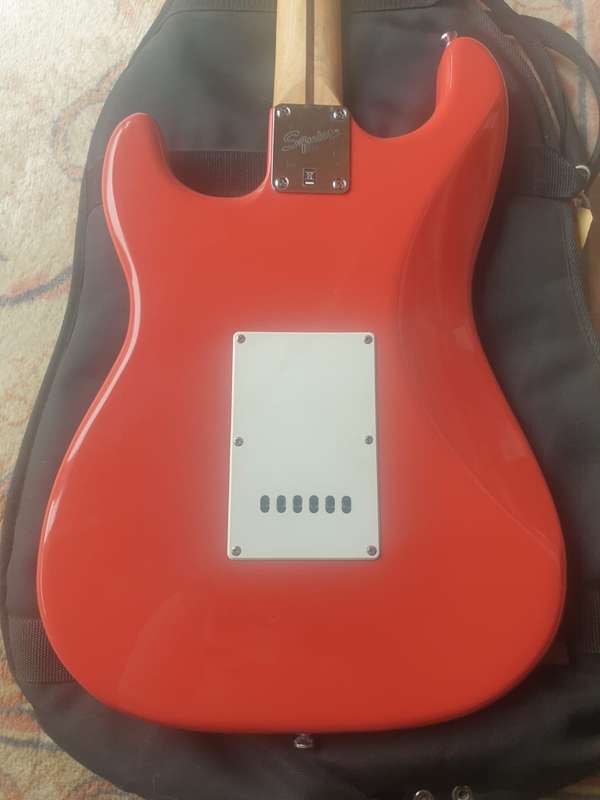 Fender Squire Bullet electric guitar with bag made in Indonesia, Red and white
