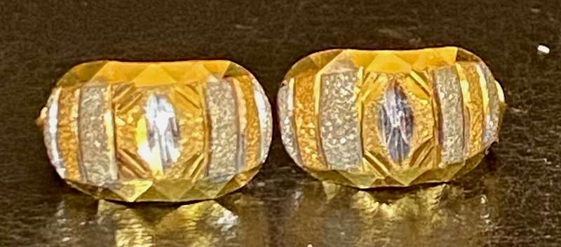 18ct yellow and white gold curved stud earrings with texture design