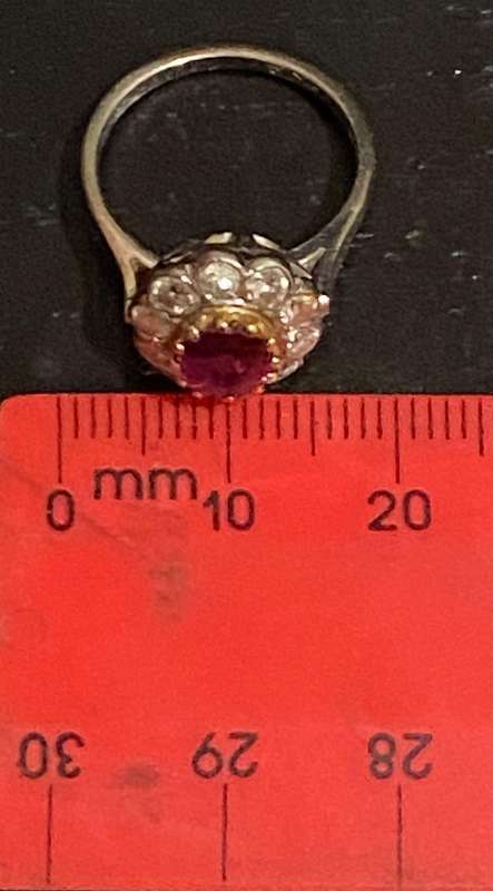Ruby and approx. 1/2 carat Diamond Flower shaped ring on 18ct white gold