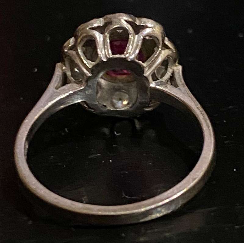 Ruby and approx. 1/2 carat Diamond Flower shaped ring on 18ct white gold