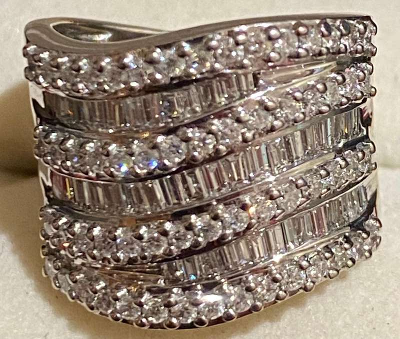 Broad wave channel set 18ct White gold and Diamond Ring