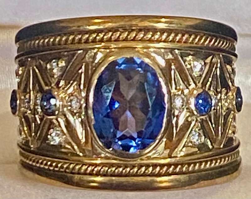 Stunning broad and heavy 9ct yellow & white gold ring with Sapphires and Cubic Zirconium's