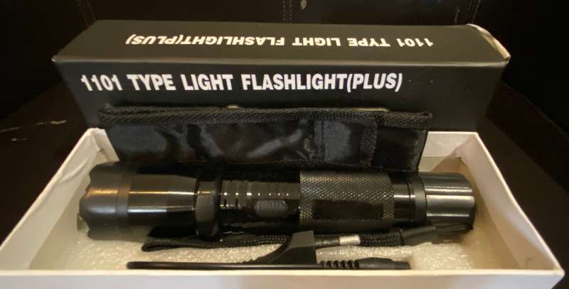 Stun gun, flashlight 1101