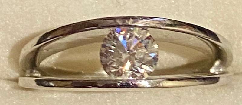 Platinum and 0.44 carat genuine Diamond solitaire Ring