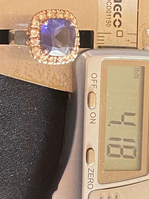 Stunning Sterling Silver ring with simulated Blue centre stone and Cubic Zircon's around