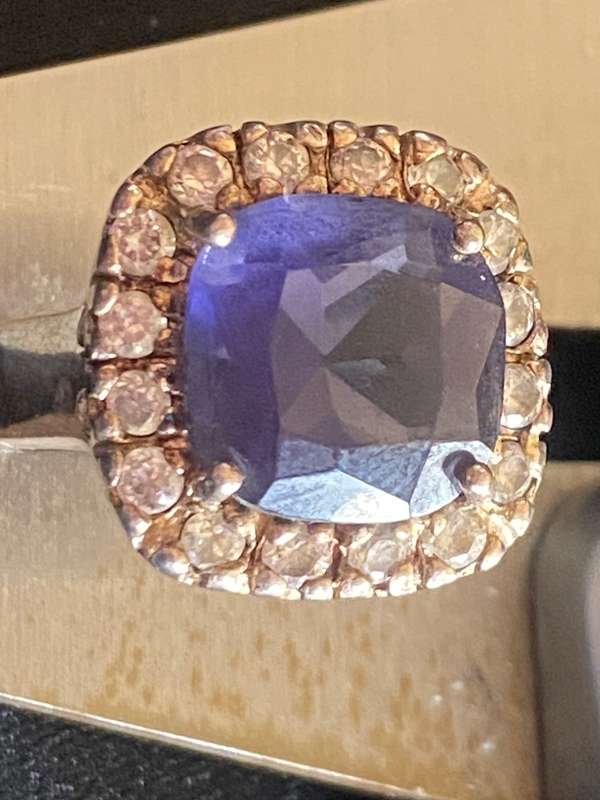 Stunning Sterling Silver ring with simulated Blue centre stone and Cubic Zircon's around