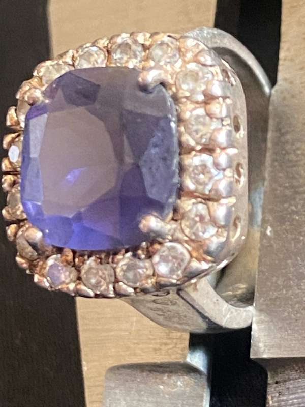 Stunning Sterling Silver ring with simulated Blue centre stone and Cubic Zircon's around