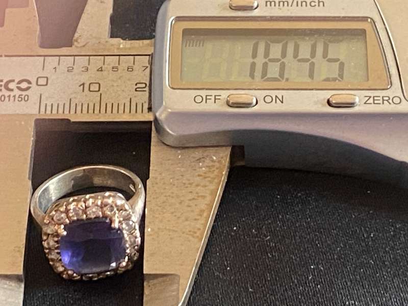 Stunning Sterling Silver ring with simulated Blue centre stone and Cubic Zircon's around