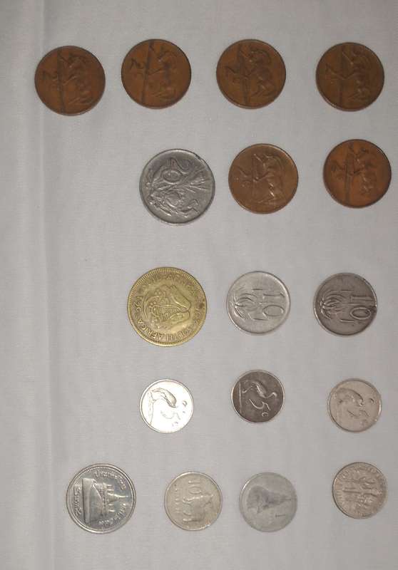 Collection of circulated coins South Africa, U S dime, Thai baht, Lesotho, Botswana coins