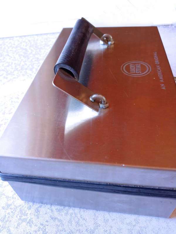Stainless steel cash box with Lucky Strike logo