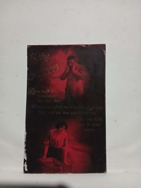 Vintage real picture postcard portrait in red