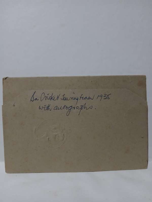 Real picture postcard of South African cricket team 1935 with full autograph sheet