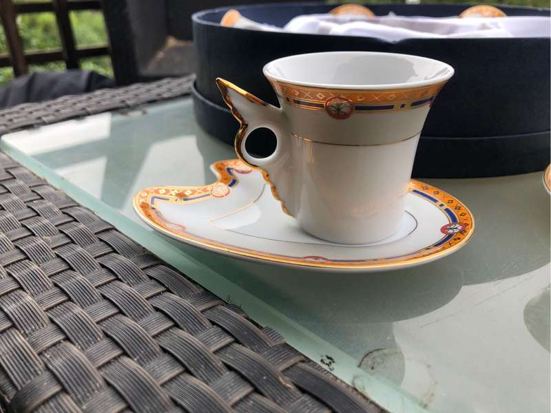 BOXED SET OF SIX WIESENTHAL COFFEE DUOS, SAUCERS ARE PALETTE SHAPED, CUPS HAVE 'WING' HANDLES