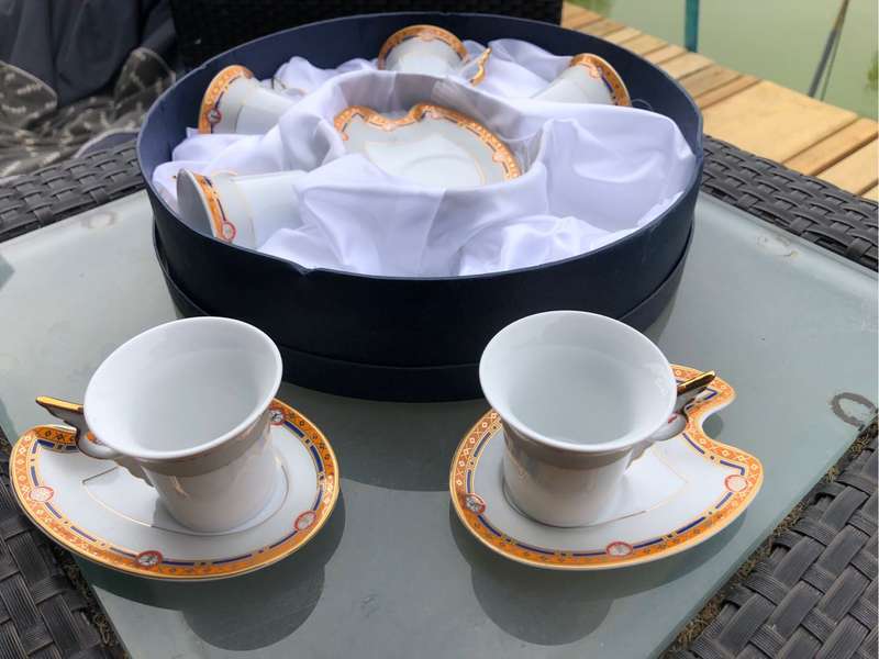 BOXED SET OF SIX WIESENTHAL COFFEE DUOS, SAUCERS ARE PALETTE SHAPED, CUPS HAVE 'WING' HANDLES