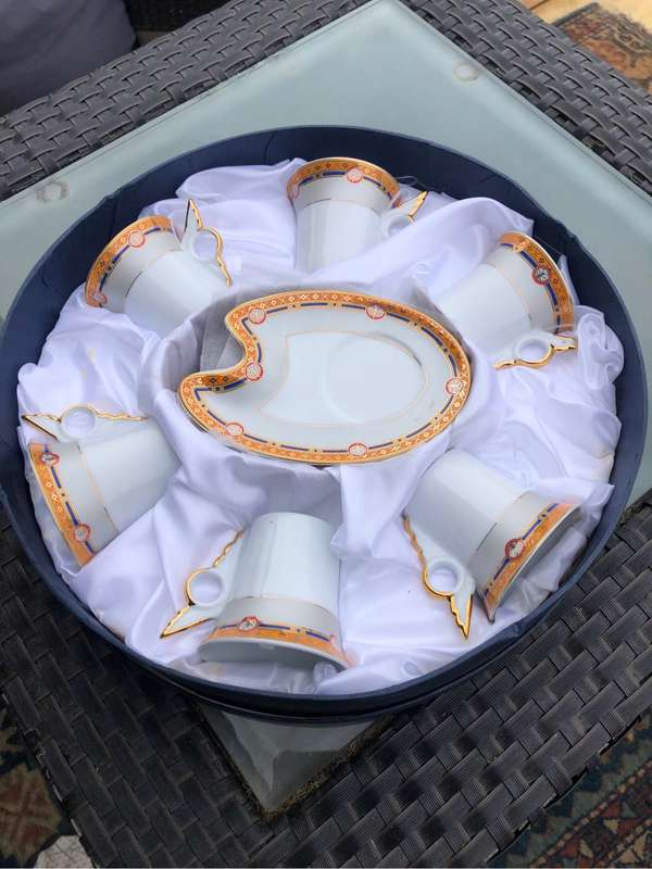BOXED SET OF SIX WIESENTHAL COFFEE DUOS, SAUCERS ARE PALETTE SHAPED, CUPS HAVE 'WING' HANDLES