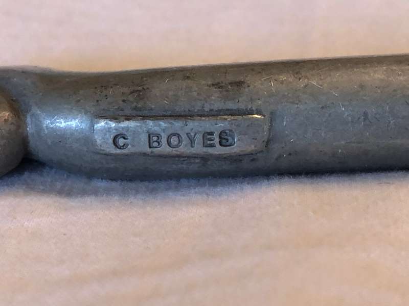 Carrol Boyes coil pattern cheese knife -  serrated blade