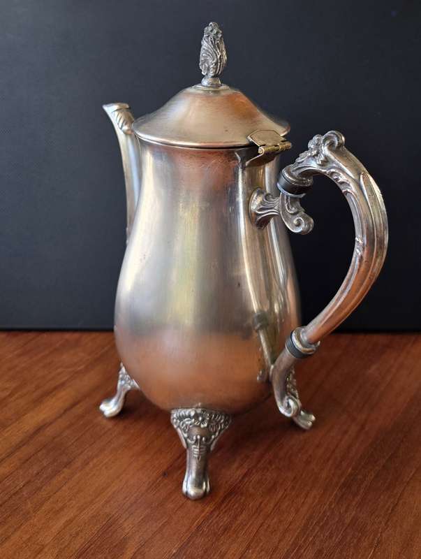 Plated Silver coffee pot, with expected patina. Completely usable & could last another 100 years.