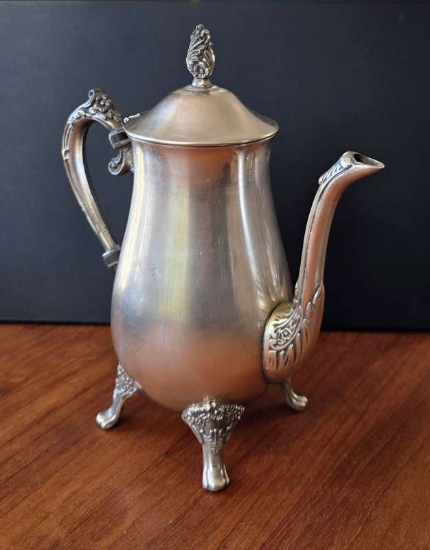 Plated Silver coffee pot, with expected patina. Completely usable & could last another 100 years.