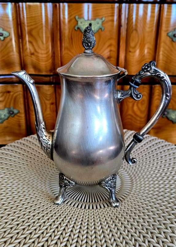 Plated Silver coffee pot, with expected patina. Completely usable & could last another 100 years.