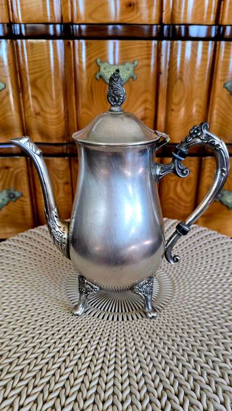 Plated Silver coffee pot, with expected patina. Completely usable & could last another 100 years.