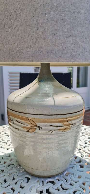 Lamp. Fabulous contemporary ceramic lamp shaped like a vintage bottle. Includes lampshade.