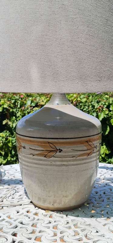 Lamp. Fabulous contemporary ceramic lamp shaped like a vintage bottle. Includes lampshade.