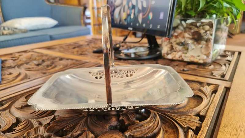 Highly decorative silverplated centre piece tray with little feet. Pretty pierced decor piece