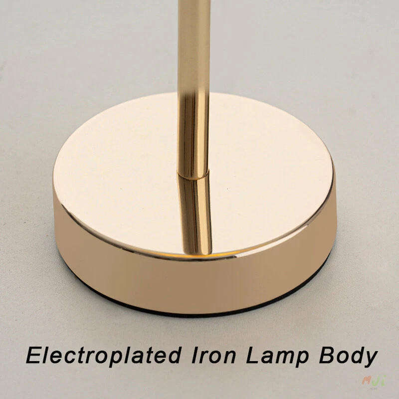 Stunning warm, luxurious table lamp with a soft white shade and adjustable brightness and lighting.