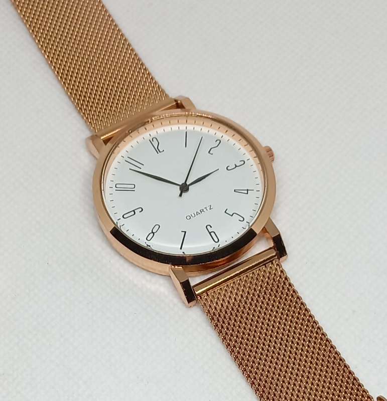 Rose gold stainless steel watch and free bracelet