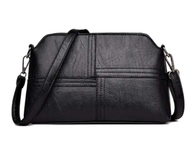 Woman's shoulder sling handbag