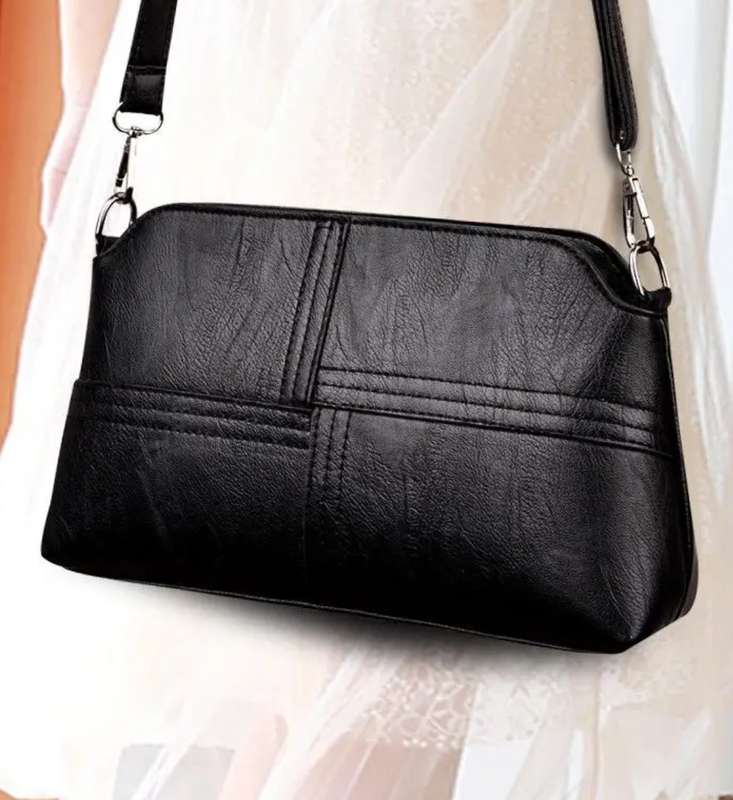 Woman's shoulder sling handbag