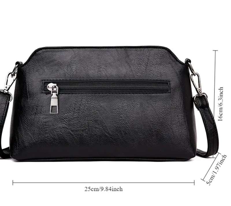 Woman's shoulder sling handbag
