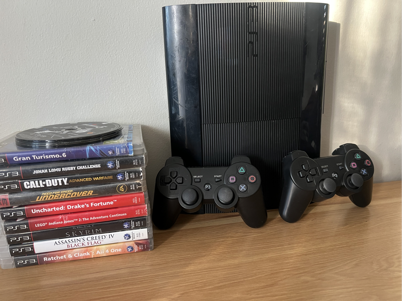 PlayStation 3 (PS3) Super Slim 500GB  Game Bundle Includes 16 Titles