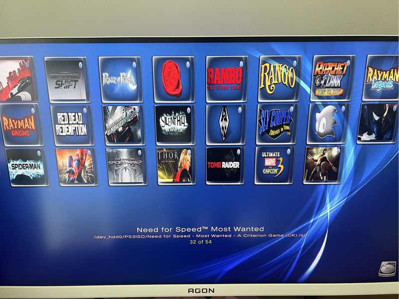 PS3 Super Slim Limited Edition (Red) loaded with 50games